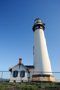 Pigeon Point lighthouse with a blue sky