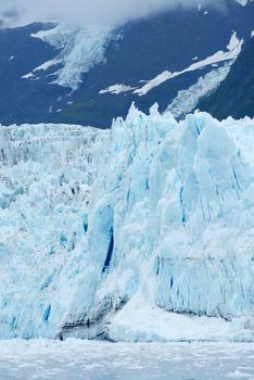 blue color of tidewater glacier in prince william sound in alaska