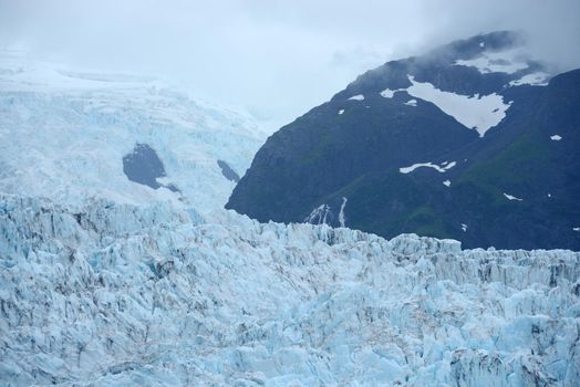 blue color of tidewater glacier in prince william sound in alaska