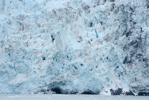 blue color of tidewater glacier in prince william sound in alaska