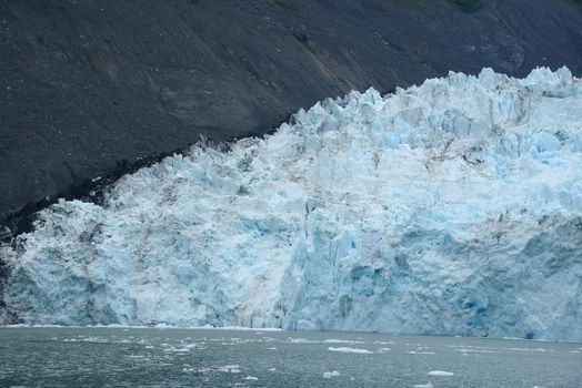 blue color of tidewater glacier in prince william sound in alaska