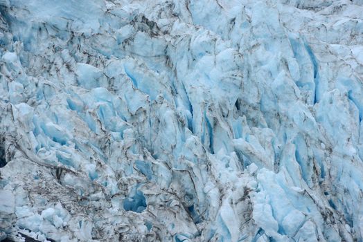 blue color of tidewater glacier in prince william sound in alaska