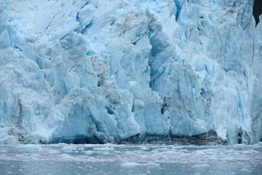 blue color of tidewater glacier in prince william sound in alaska