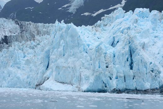 blue color of tidewater glacier in prince william sound in alaska