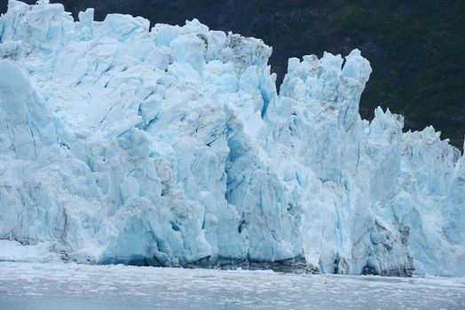 blue color of tidewater glacier in prince william sound in alaska