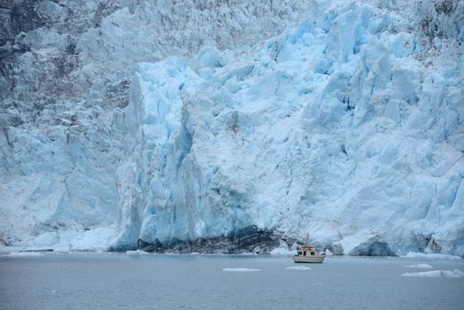 blue color of tidewater glacier in prince william sound in alaska