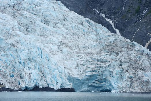 blue color of tidewater glacier in prince william sound in alaska