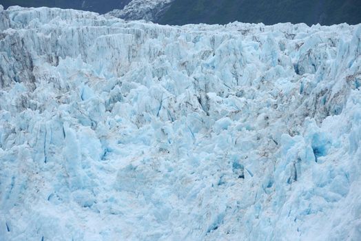blue color of tidewater glacier in prince william sound in alaska