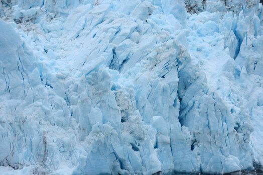 blue color of tidewater glacier in prince william sound in alaska