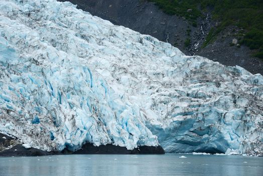 blue color of tidewater glacier in prince william sound in alaska