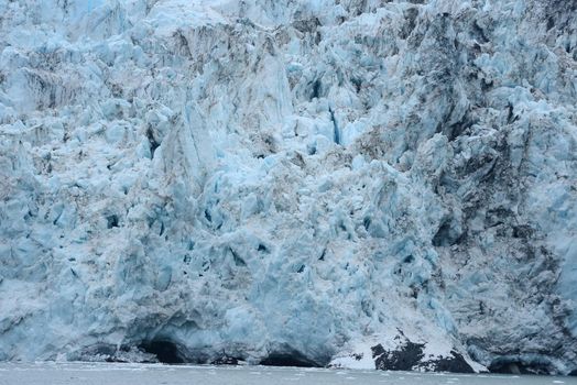 blue color of tidewater glacier in prince william sound in alaska