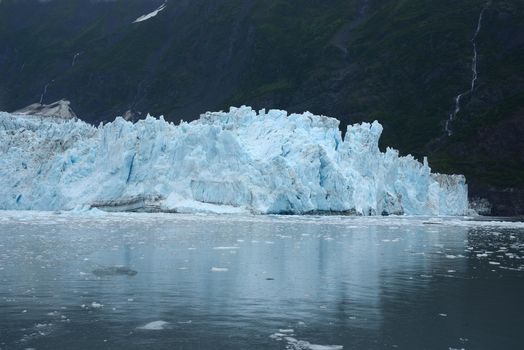 blue color of tidewater glacier in prince william sound in alaska