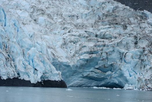 blue color of tidewater glacier in prince william sound in alaska