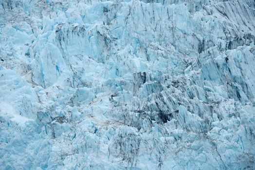 blue color of tidewater glacier in prince william sound in alaska