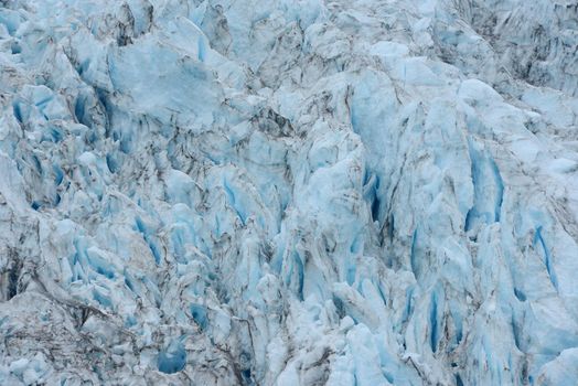 blue color of tidewater glacier in prince william sound in alaska