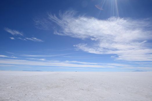 a surreal landscape of infinite view of salt flat in uyuni, bolivia