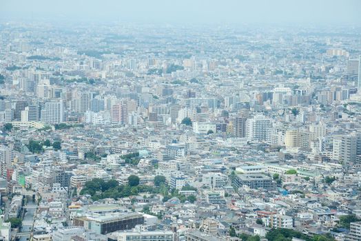 an aerial view of buildings in tokyo as seen from a building observatory