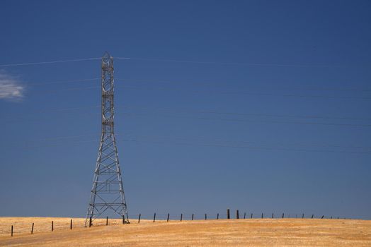 power line on grass hill