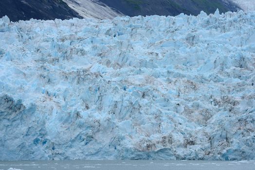 blue color of tidewater glacier in prince william sound in alaska