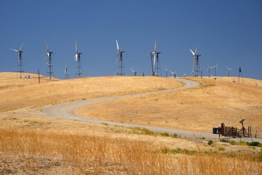 wind power turbine on golden grass hills