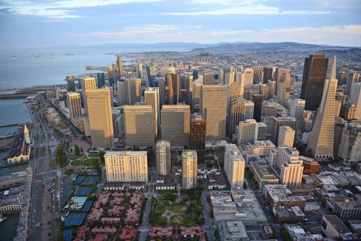 an aerial view of downtown san francisco during sunset