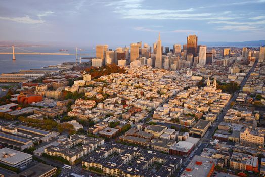 an aerial view of downtown san francisco during sunset