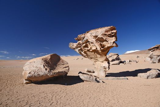 wind eroded rock in atacama desert in bolivia