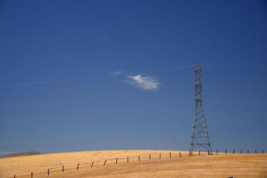 power line on grass hill