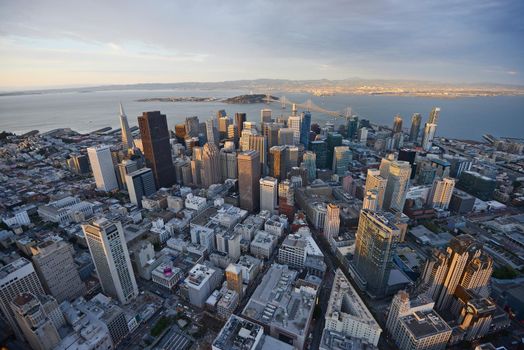 an aerial view of downtown san francisco during sunset