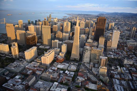 an aerial view of downtown san francisco during sunset