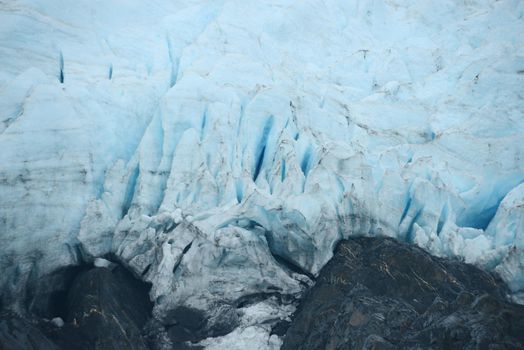 blue ice of portage glacier in alaska
