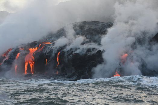 lava flow to pacific ocean at big island, hawaii