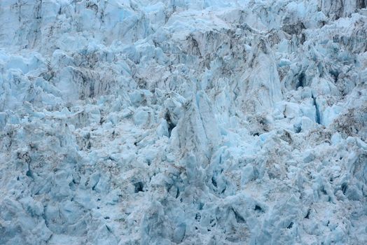 blue color of tidewater glacier in prince william sound in alaska