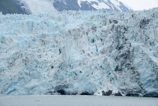 blue color of tidewater glacier in prince william sound in alaska