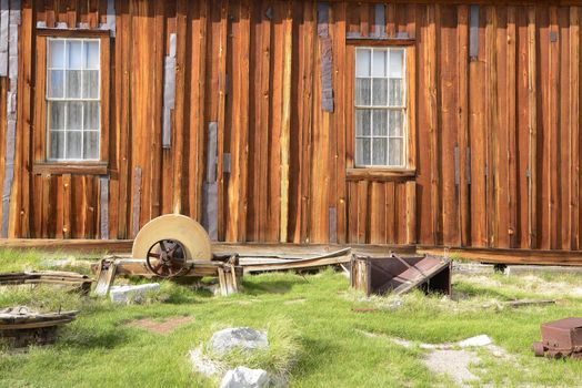 a wooden wall in Bodie historic state park of a ghost town from a gold rush era in Sierra Nevada