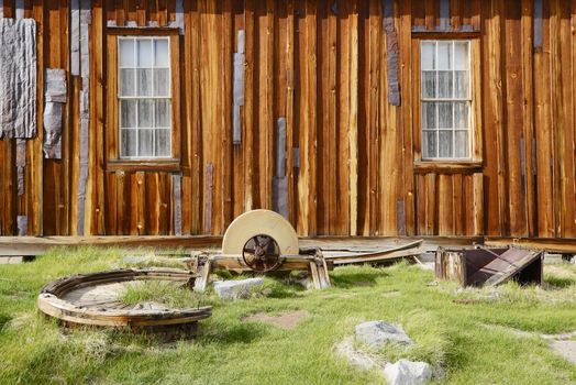 a wooden wall in Bodie historic state park of a ghost town from a gold rush era in Sierra Nevada