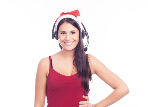 Christmas headset woman from telemarketing call center wearing red santa hat talking smiling isolated on white background.