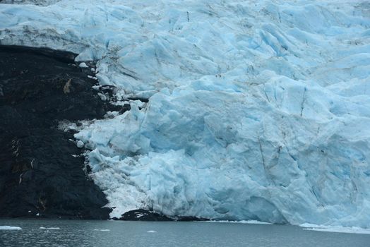 blue ice of portage glacier in alaska
