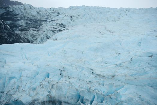 blue ice of portage glacier in alaska
