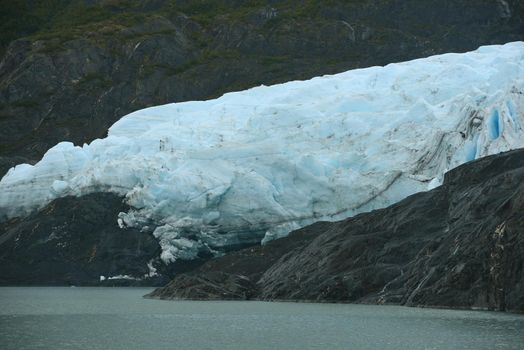 blue ice of portage glacier in alaska
