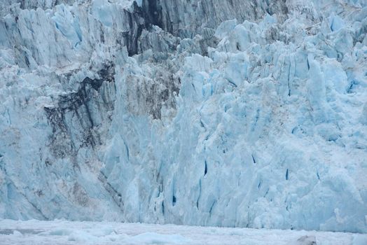 blue color of tidewater glacier in prince william sound in alaska