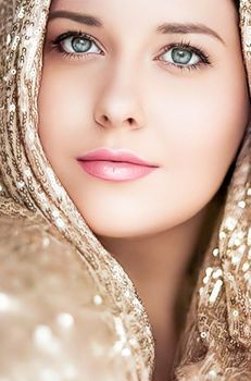 Beauty, luxury fashion and glamour, woman dressed in gold, portrait