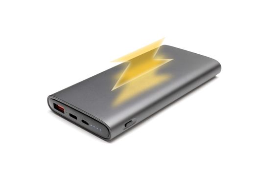 Fully charged portable powerbank with two usb outputs isolated on a white background. Powerbank for charging mobile devices. Lightning charging symbol on top, illustration