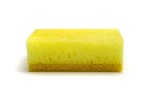Single yellow kitchen sponge isolated on white background, closeup side view