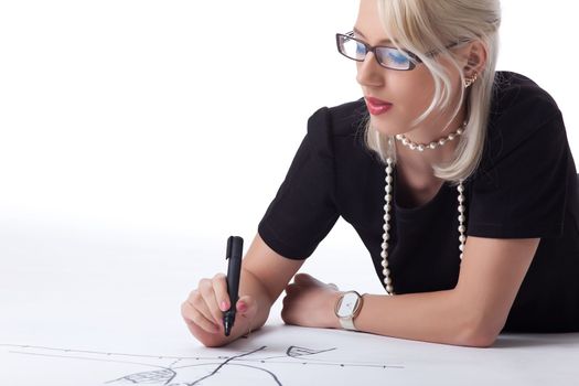 Cute blond woman thnking on drawing graph isolated