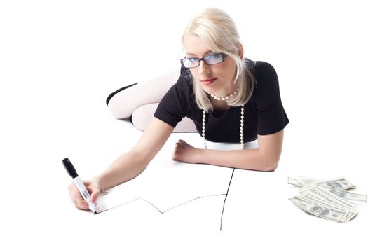 Clever blond sexy woman lay and draw financial graph isolated