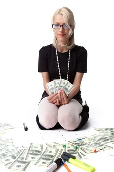 Happy blond business woman show income dollars isolated