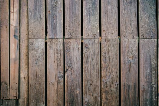 Brown wood texture background from natural tree. A wooden panel with a beautiful dark pattern, vintage hardwood floor texture.