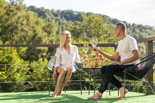 couple on the terrace in the mountains.