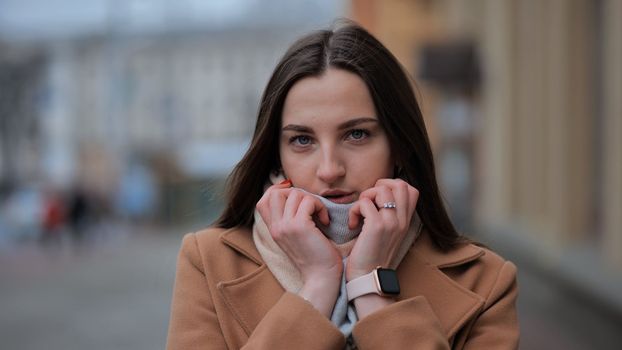 Portrait of a young girl freezing on a cold day
